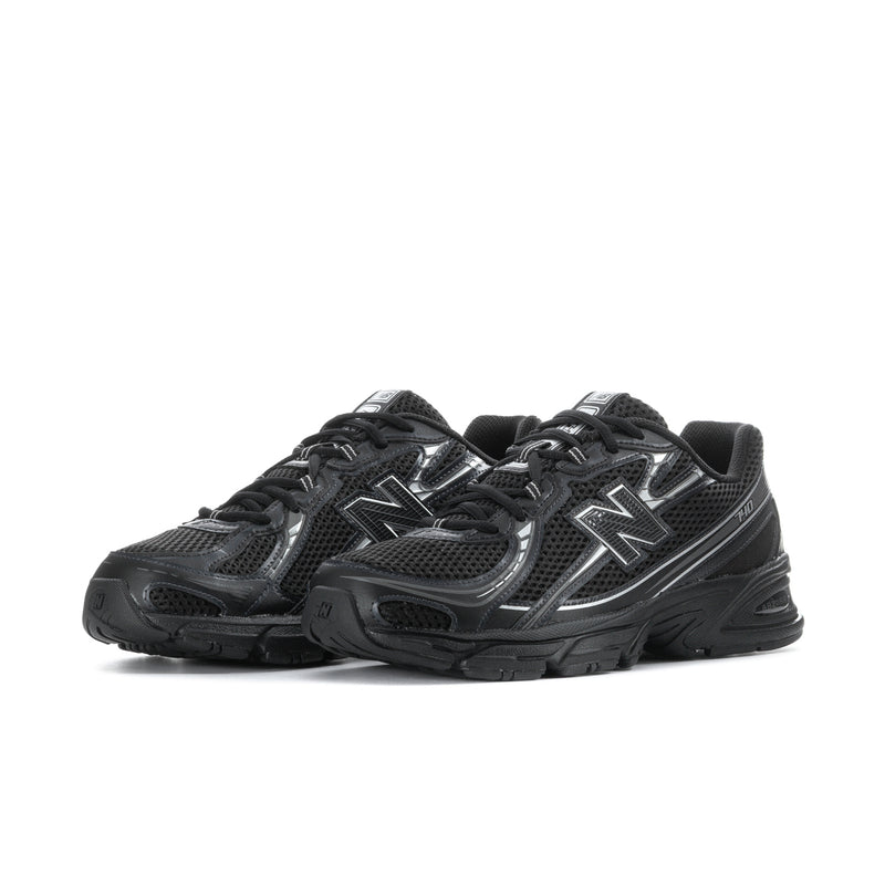 Pair of men's black running shoes with metallic N logo, lace-up mesh upper and thick tread