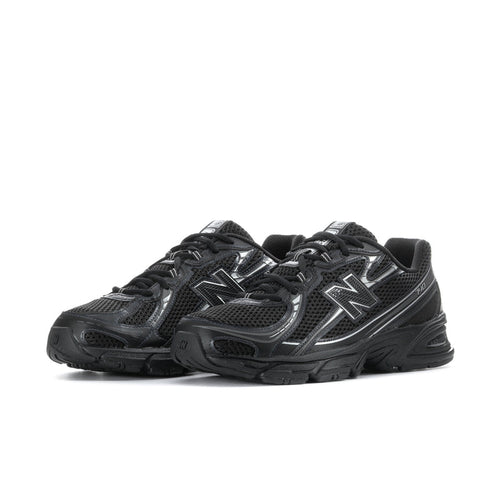 Pair of men's black running shoes with metallic N logo, lace-up mesh upper and thick tread