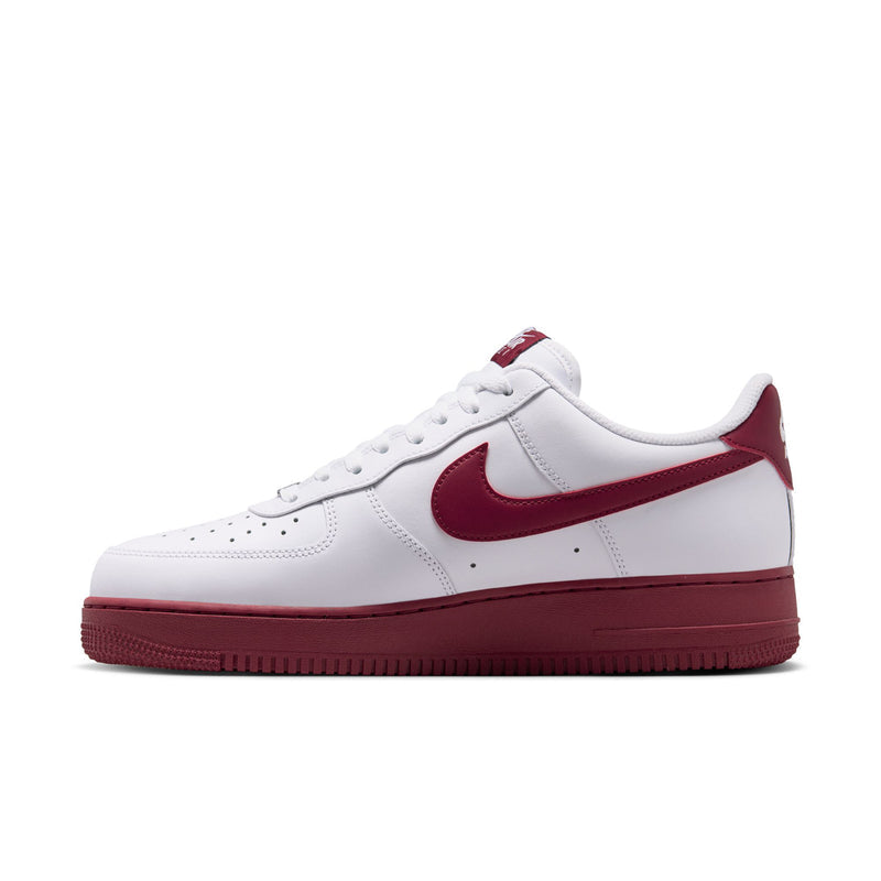 Men's Nike Air Force 1 low-top sneakers side view, white leather with Team Red Swoosh