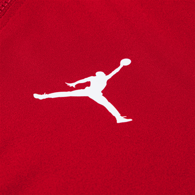 Red tricot fabric with white Jumpman silhouette graphic