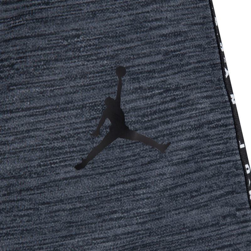 Jordan silhouette logo on heather grey tricot fabric with black side stripe trim.