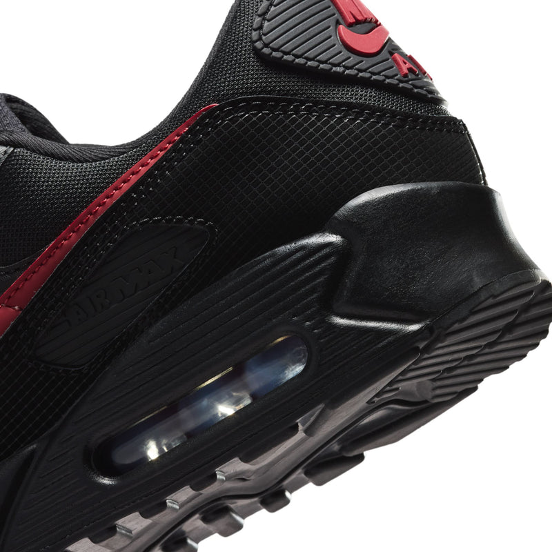 Nike Air Max 90 men's sneaker midsole close-up, black with visible Air window