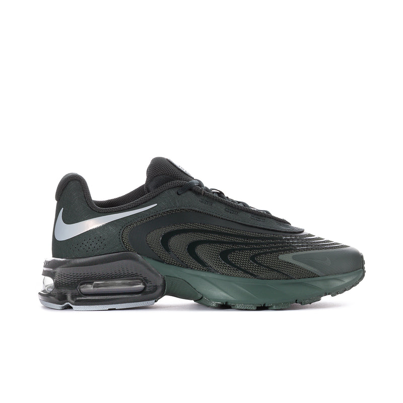 Men's running shoe in dark green and black, with white Swoosh and visible air unit