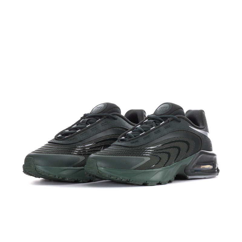 Men's running shoe, side view, dark green and black with white Swoosh and air pod