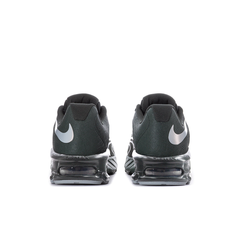 Men's running shoe heel view, dark green and black upper with white Swoosh and air unit