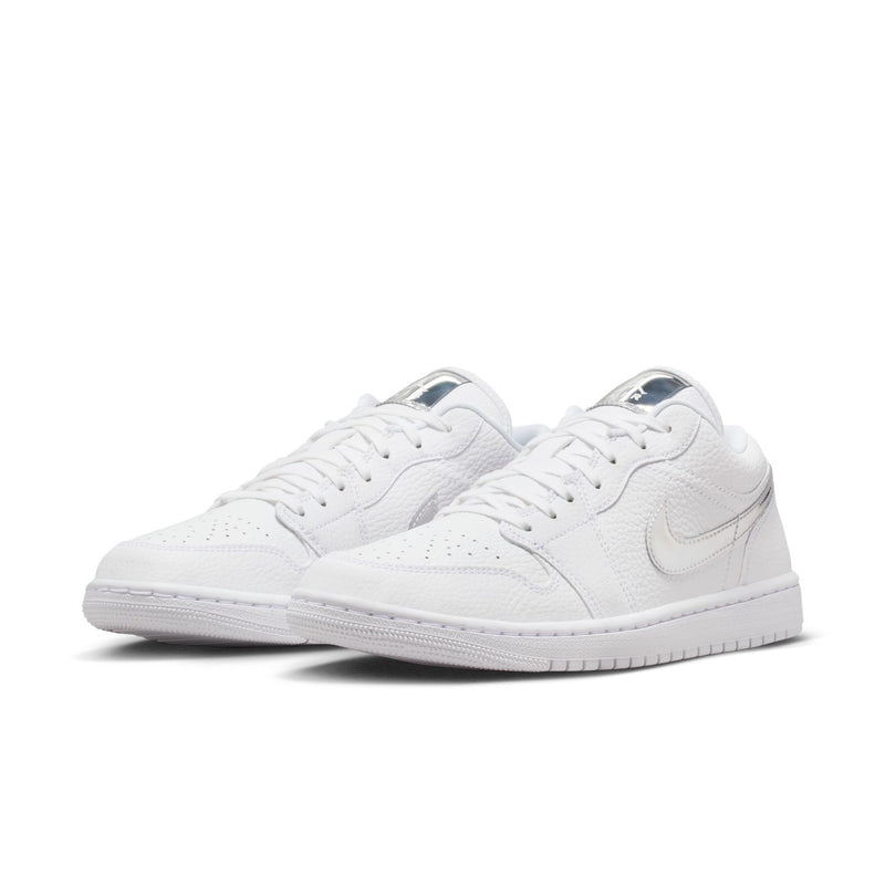 Women's white low-top sneakers, angled side view with Nike Swoosh and laces