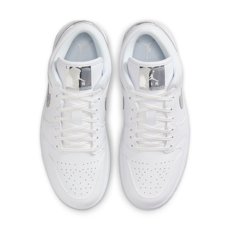 Pair of women's white low-top sneakers, top view with lace eyelets and padded collars