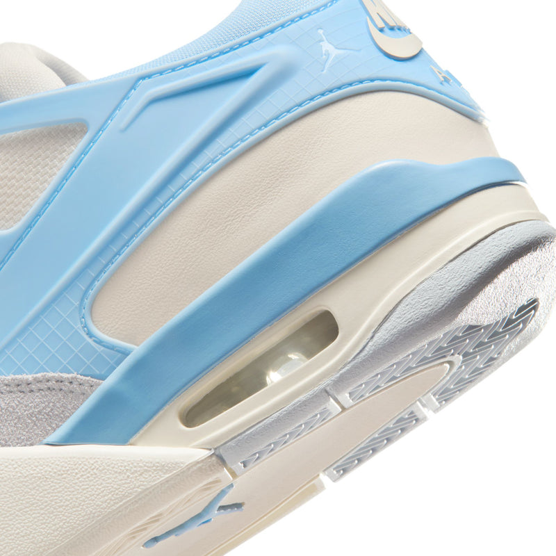 Women's sneaker side close-up, light blue overlay with Air unit window.