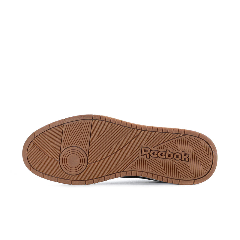 Men's Reebok low-top sneakers outsole, brown rubber tread with Reebok logo