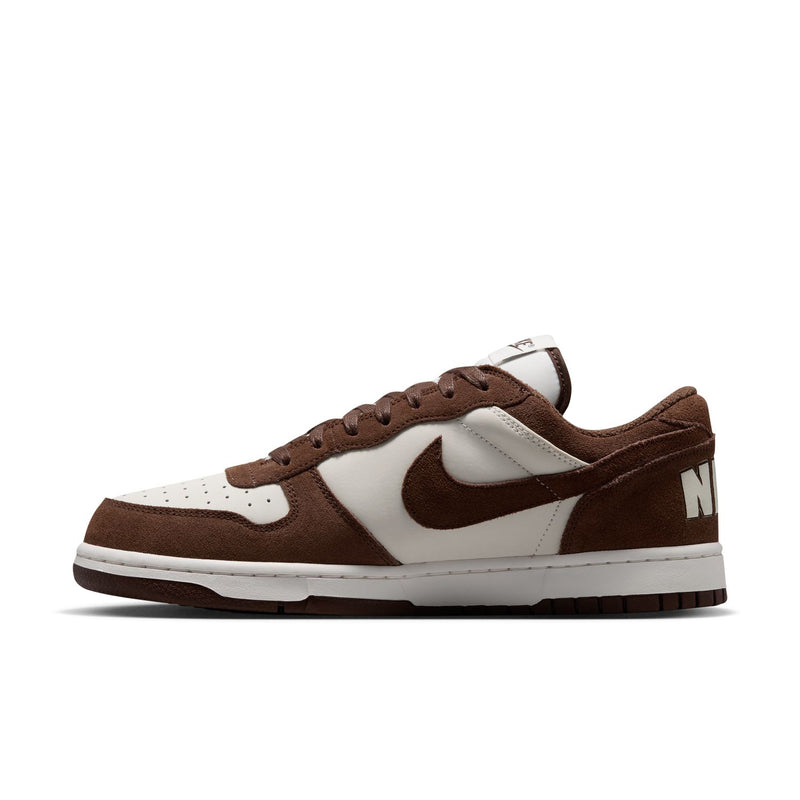 Men's low-top Nike sneakers side profile in brown and white with swoosh and lace-up upper