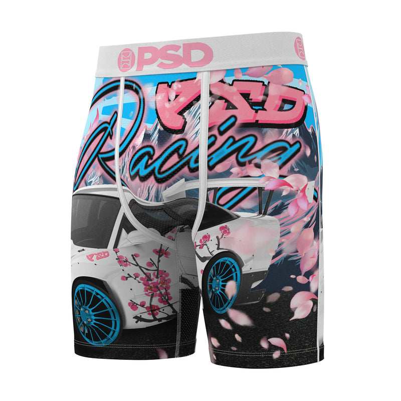 Men's boxer briefs with pink, blue race car collage and cherry blossom details, grey waistband
