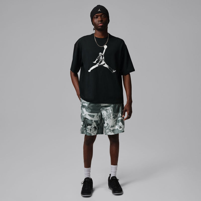 Men's knee-length graphic shorts in dark green with white print and black waistband