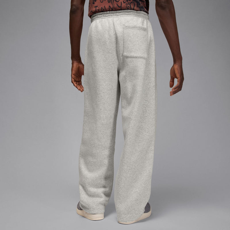Men's heather grey oversized sweatpants with side pockets and relaxed fit