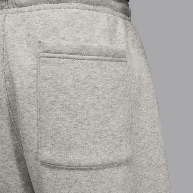 Heather grey sweatpants back view: stitched pockets and elastic waistband