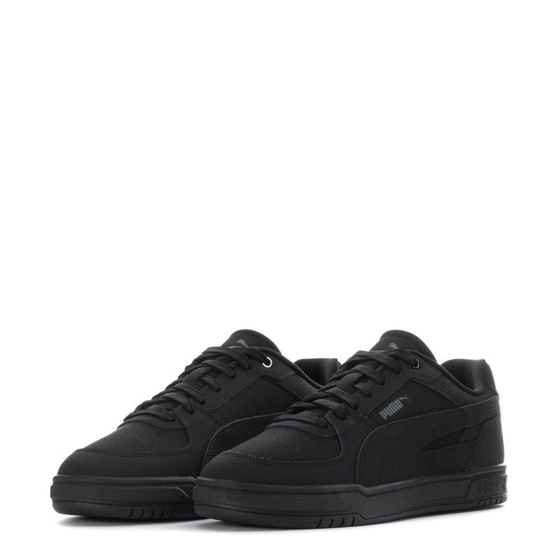 Puma youth black low-top sneakers, two pairs shown side-by-side