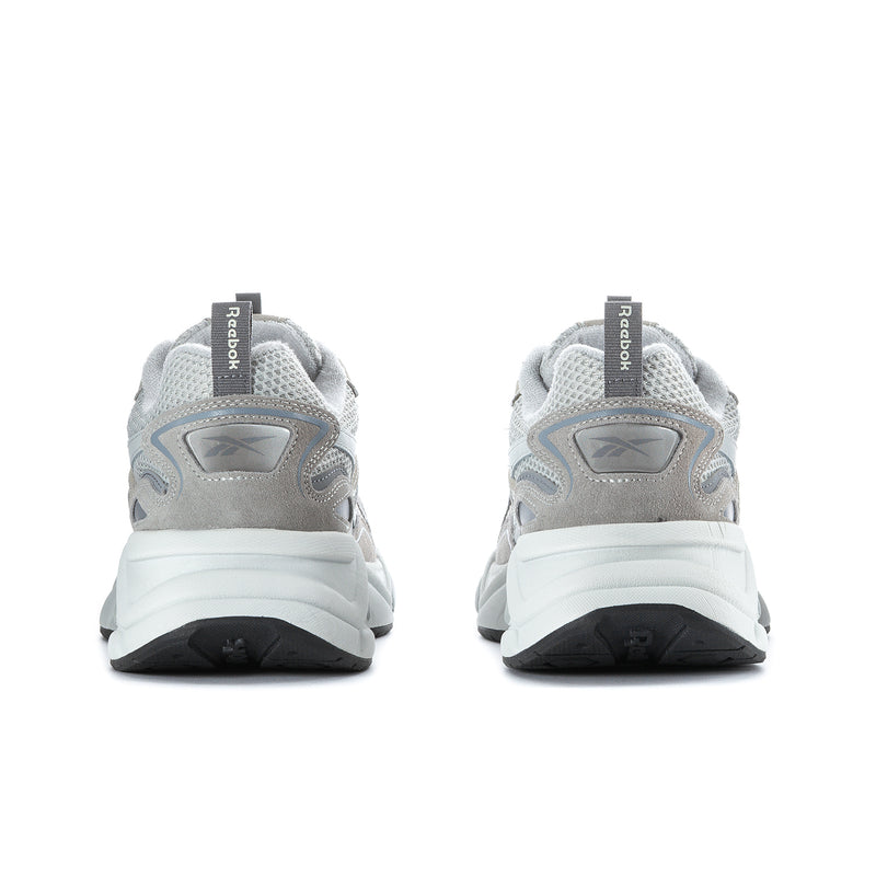 Men's running shoes, heel view with Reebok text on collar, light grey upper