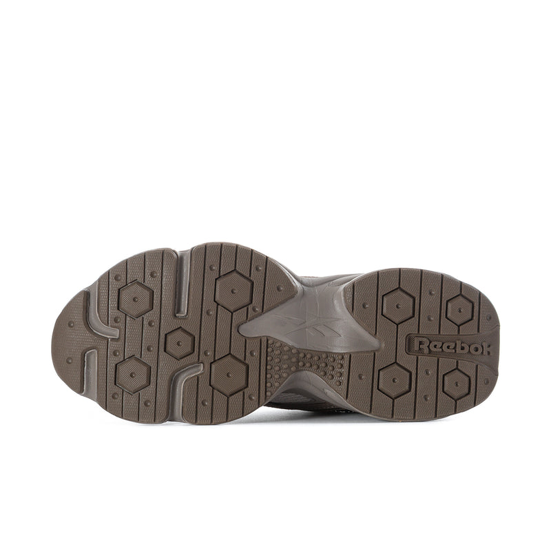 Men's running shoe outsole tread with rubber grip pattern and Reebok label