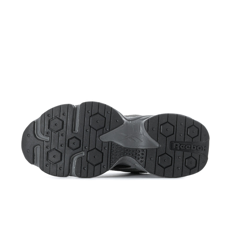 Men's running sneaker outsole with hex tread pattern and Rocker-style sole