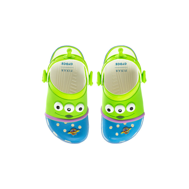 Kids' neon green clog pair with alien face design on the front