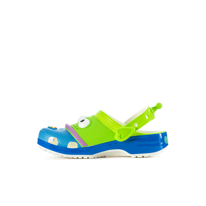 Kids' neon green, blue, and purple clog with alien face detail on the upper