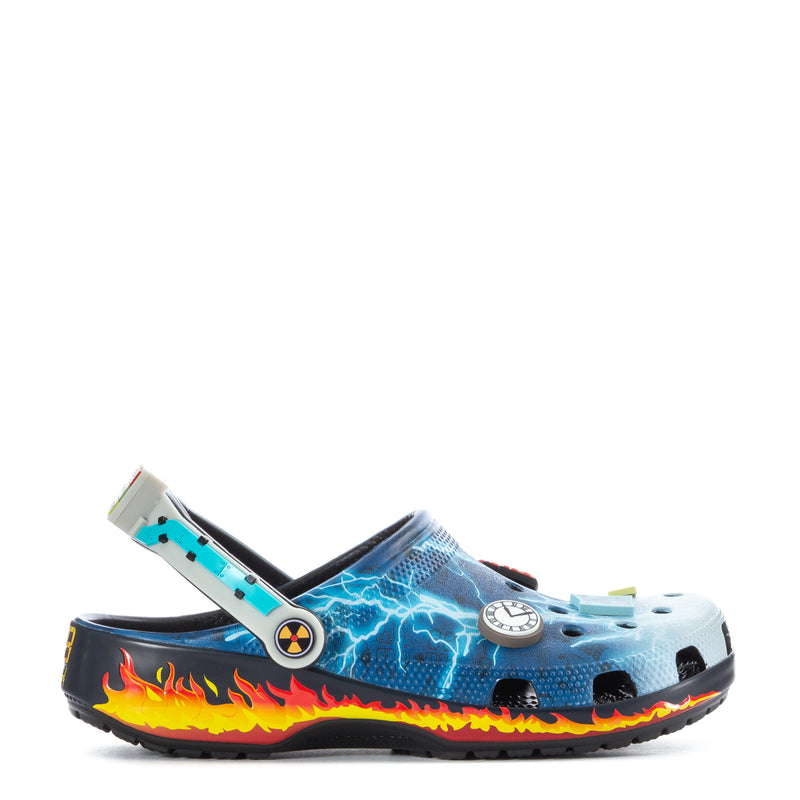 Men's blue clogs with lightning graphic, flame trim, and adjustable heel strap
