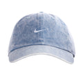Light blue denim Nike unstructured cap with white curved bill and swoosh