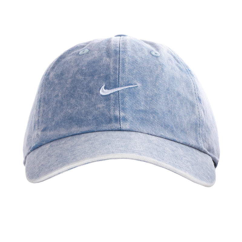 Light blue denim Nike unstructured cap with white curved bill and swoosh
