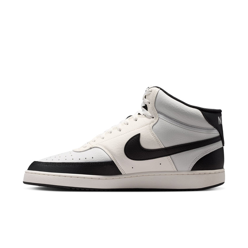 Men's mid-top sneakers, off-white upper with black swoosh and white rubber sole.