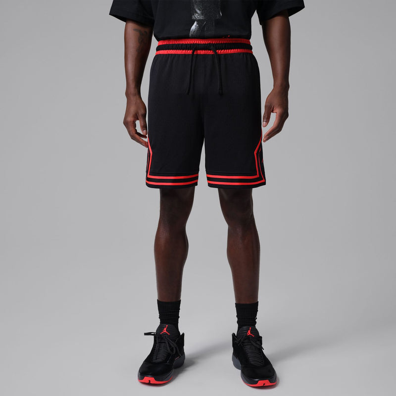 Men's black athletic shorts with red side stripes and striped hem cuffs