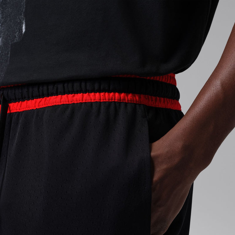 Men's black athletic shorts with red elastic waistband and contrast trim band