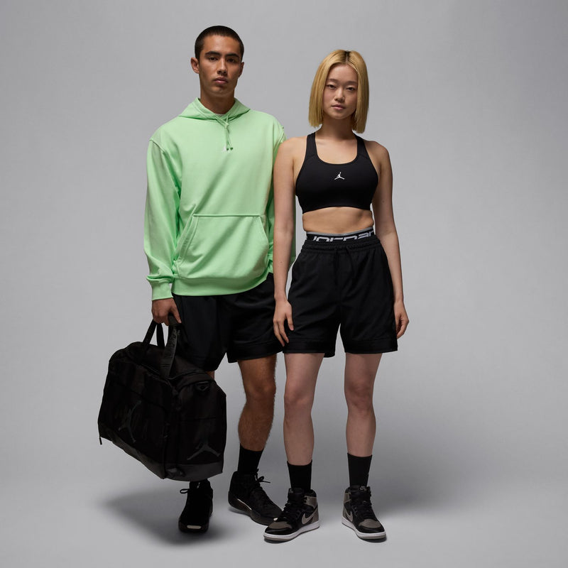 Men's black woven shorts with elastic waistband and side pockets, relaxed fit