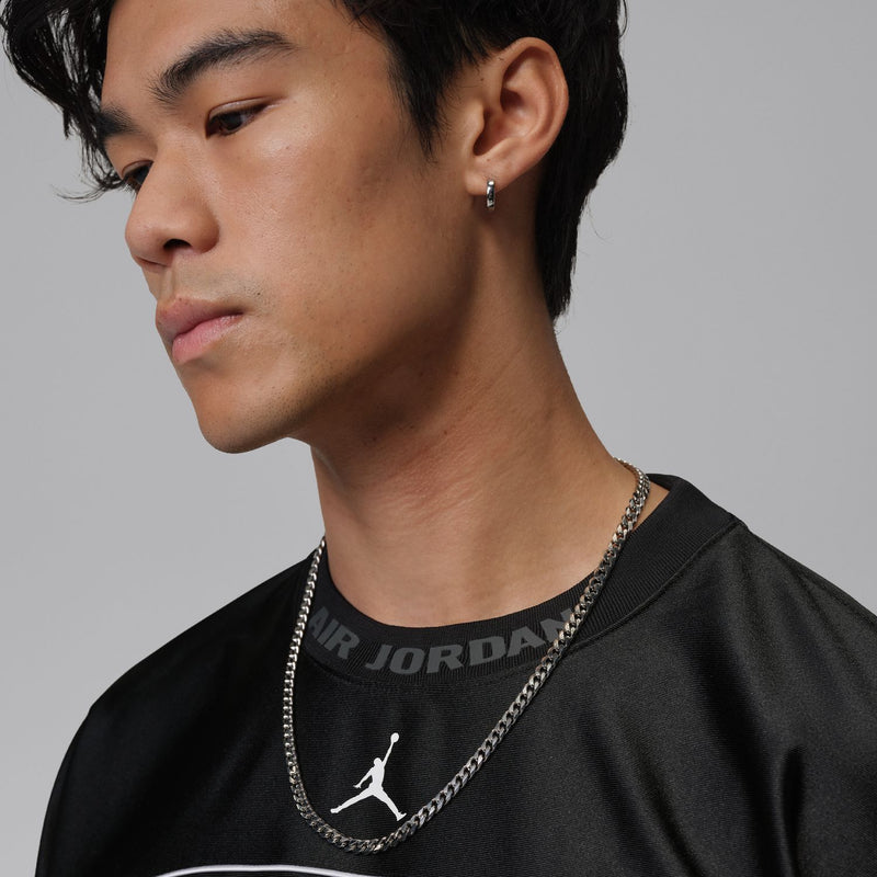 Men's black jersey close-up with Air Jordan logo print on the crew collar