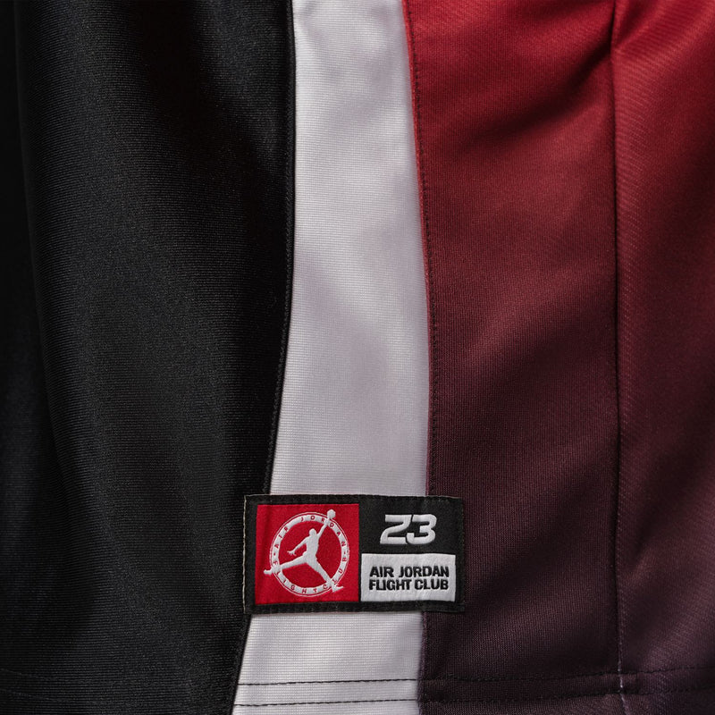 Air Jordan Flight Club woven patch on black, white and red jersey panel