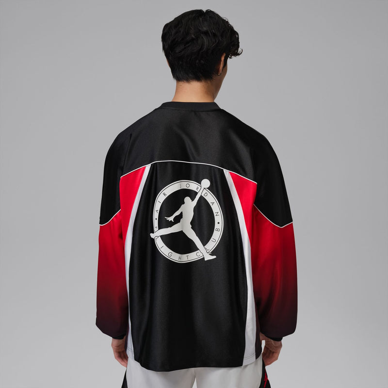 Men's black jersey back view with large circular Flight Club Air Jordan graphic