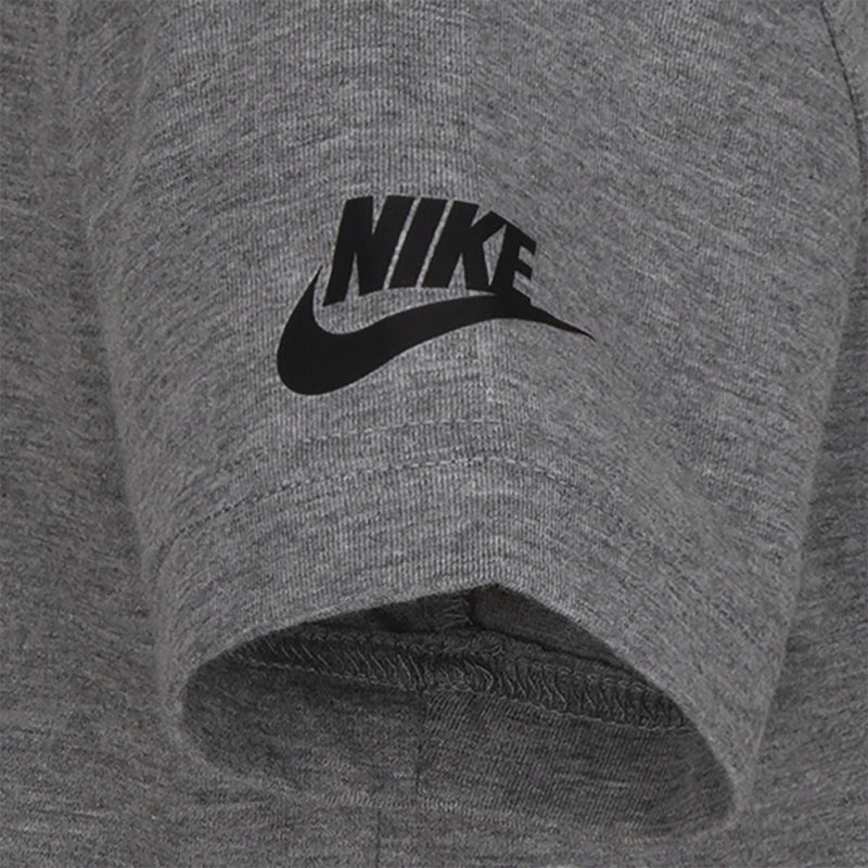Kids' carbon heather gray tee sleeve detail with black Nike logo print.