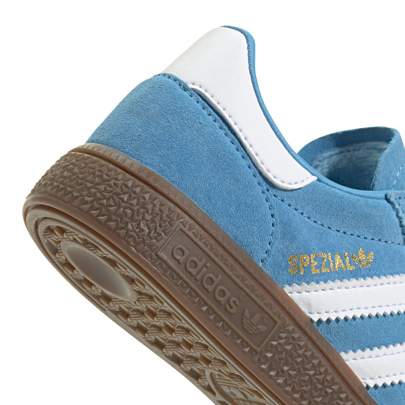 Kids light blue suede sneaker with white stripes and brown gum outsole