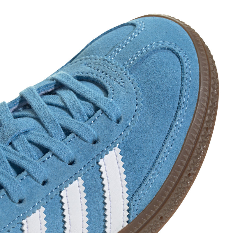 Kids light blue suede sneaker with lace-up eyelets, white stripes, gum sole