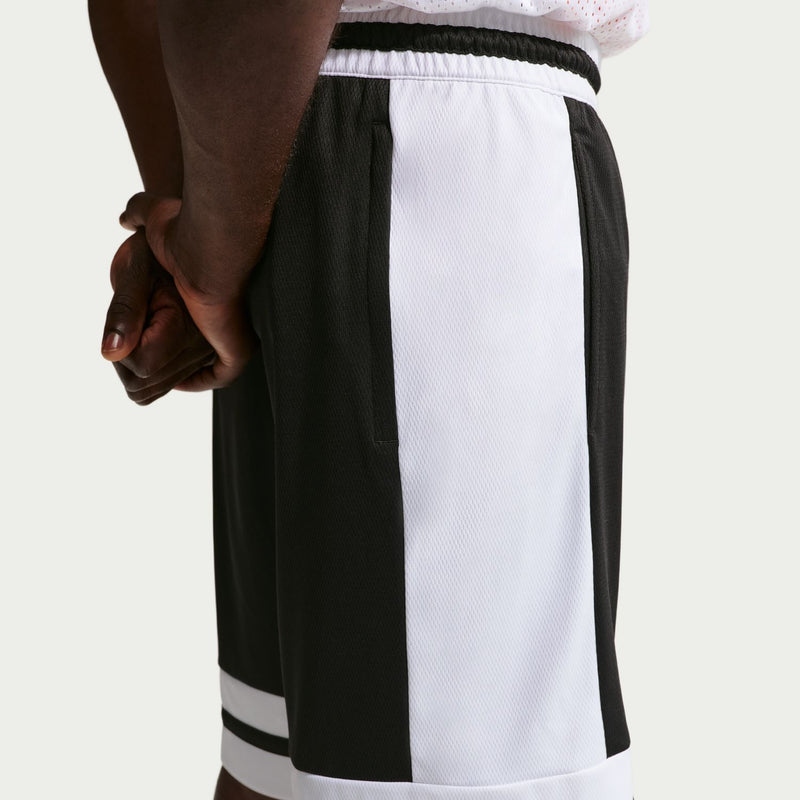 Black basketball shorts with white side panel, elastic waistband, and drawstring