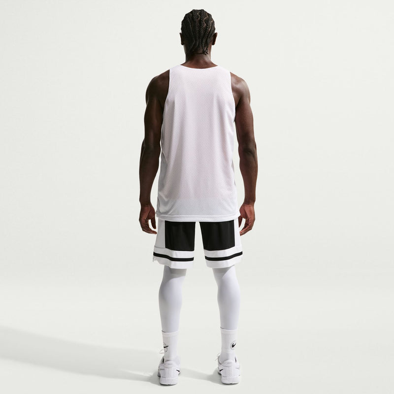 Back view of black basketball shorts with white hem stripe and drawstring waistband