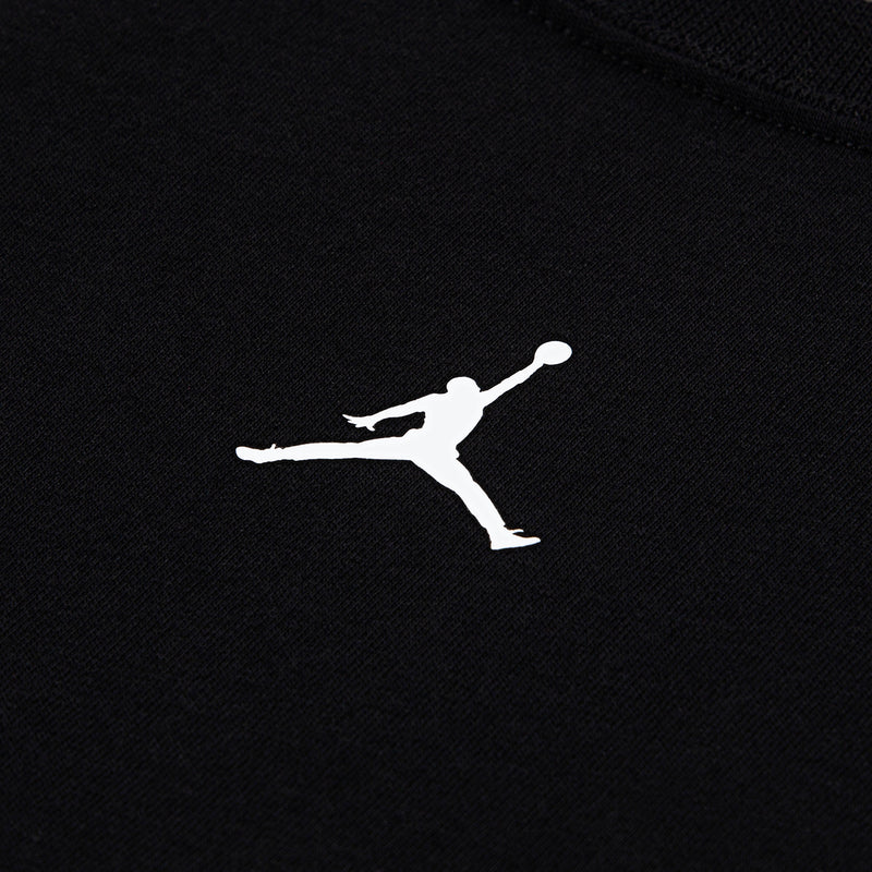 Black kids tee with white Jumpman logo on chest, short-sleeve knit