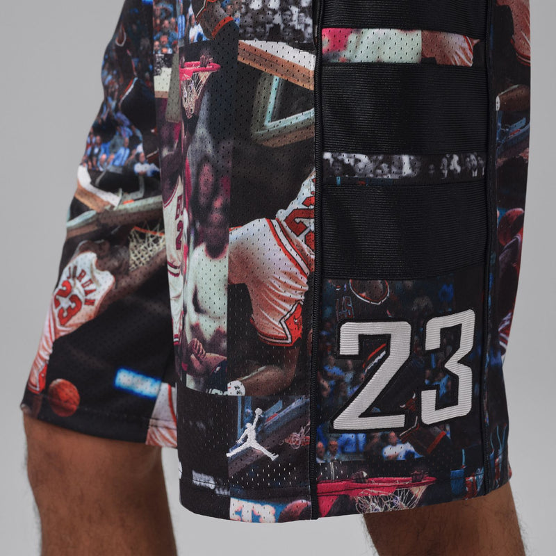 Black mesh basketball print shorts with side pocket panel and number graphic