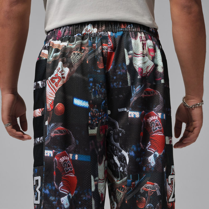 Black mesh basketball print shorts with all-over graphic and elastic waistband