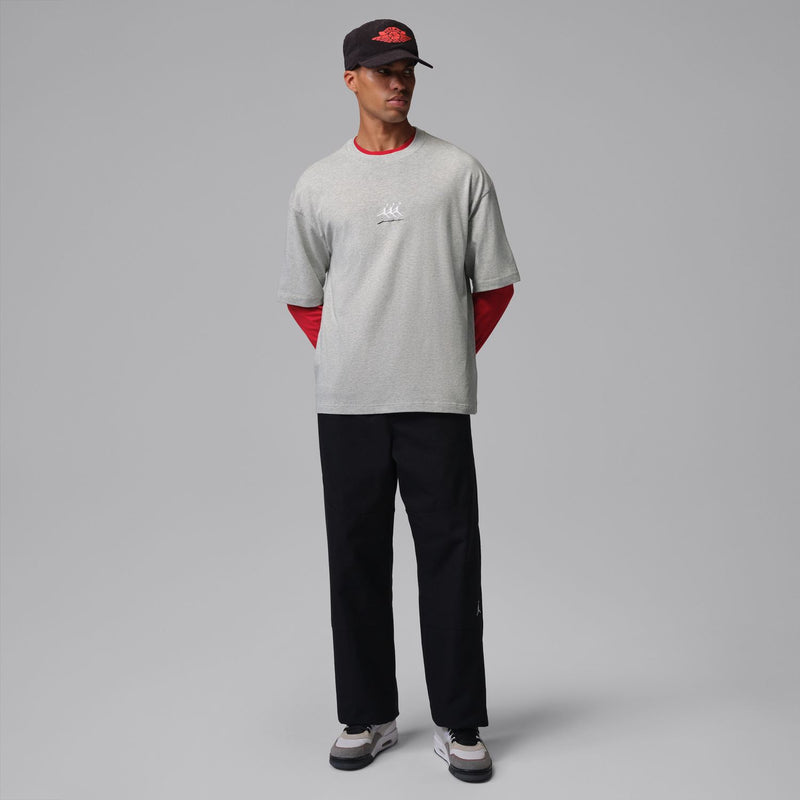 Grey heather oversized crewneck T-shirt with red neckline and sleeve trim, chest graphic