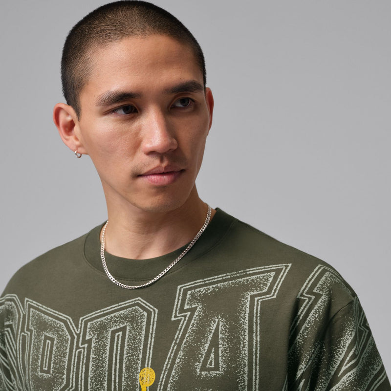 Cargo khaki crewneck T-shirt close-up of front graphic and neckline