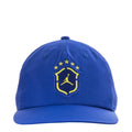 Royal blue snapback cap with yellow Jordan shield logo and embroidered stars