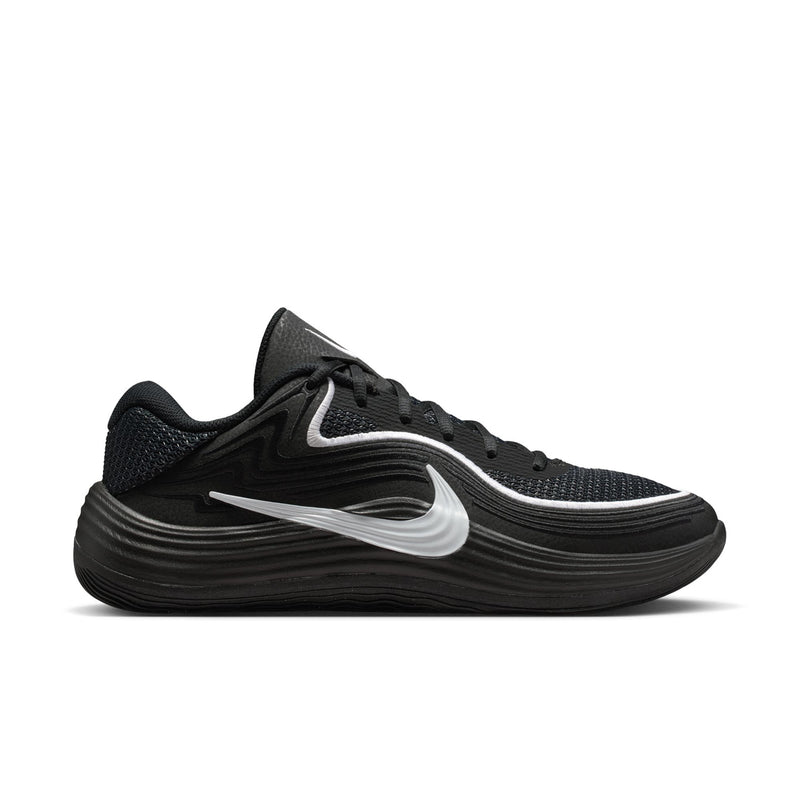 Men's black low-top sneakers with white Nike swoosh and lace-up front