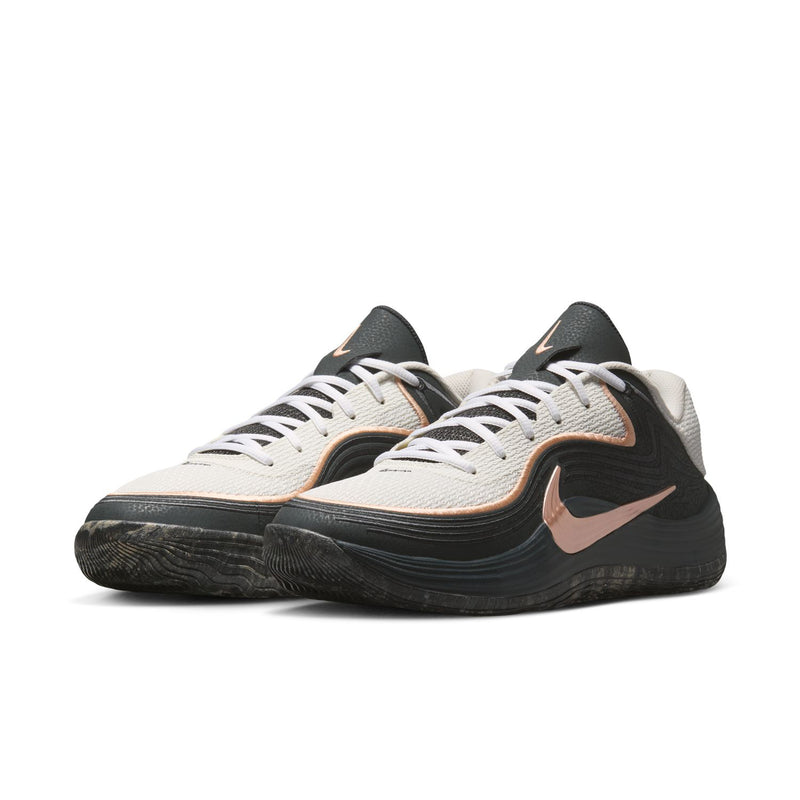 Men's low-top running shoes, white upper with black sidewall and rose-gold swoosh
