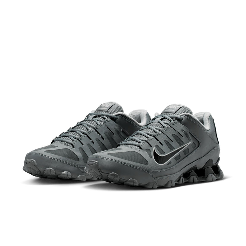 Men's training shoes, smoke grey with black panels, lace-up design, grippy tread sole.