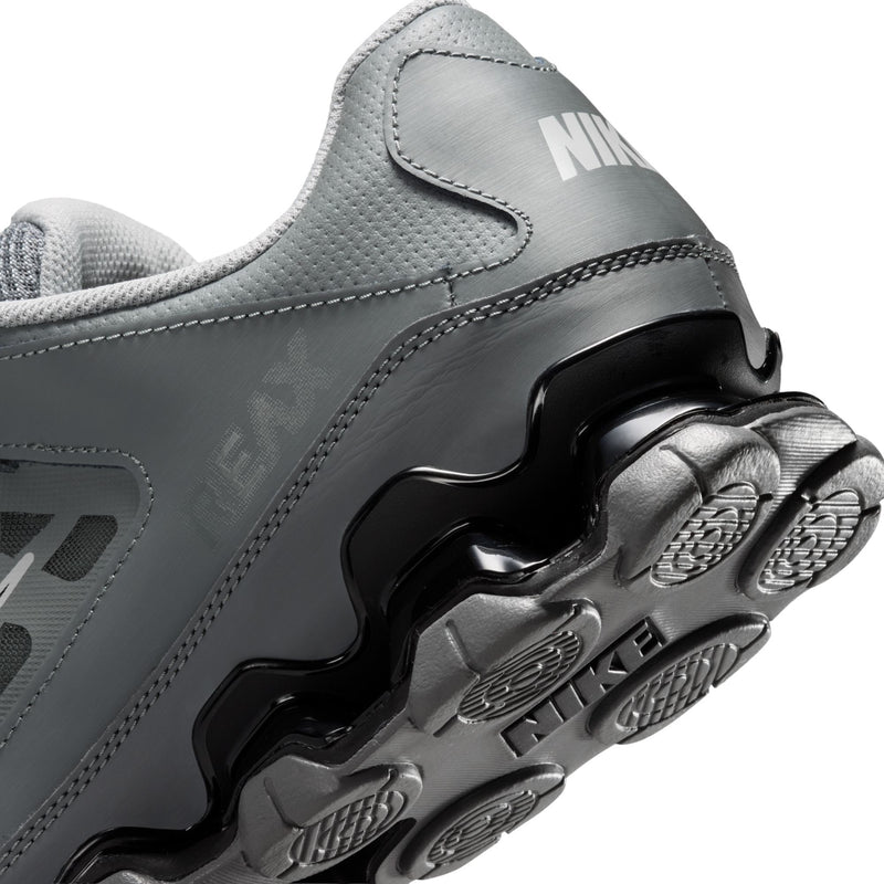 Men's training shoes heel detail with smoke grey upper, black TPU pods, and textured tread.
