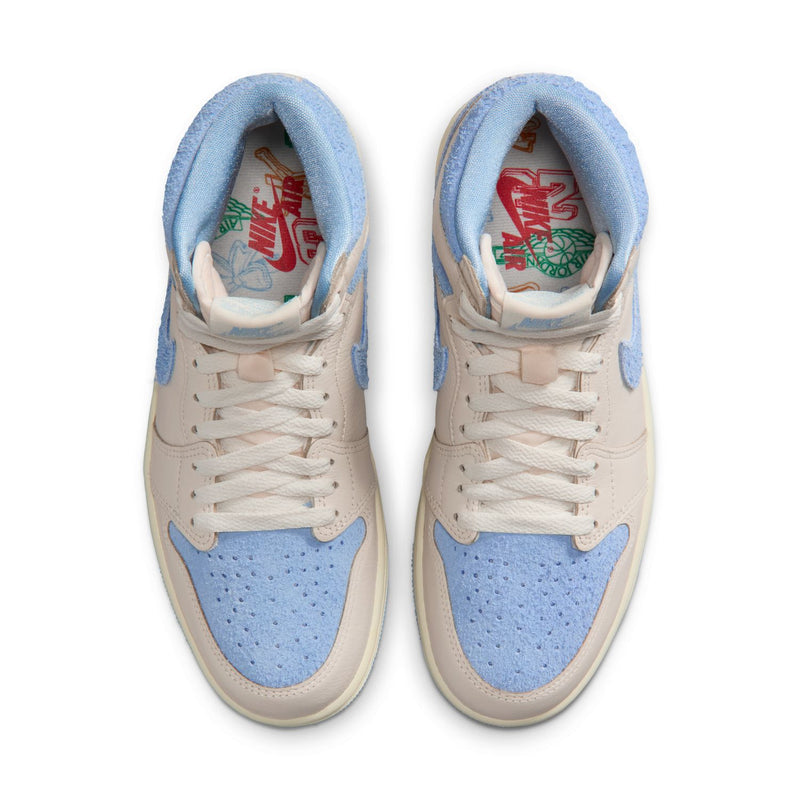 High-top sneaker tongue and collar view with light blue lining and lace-up front.